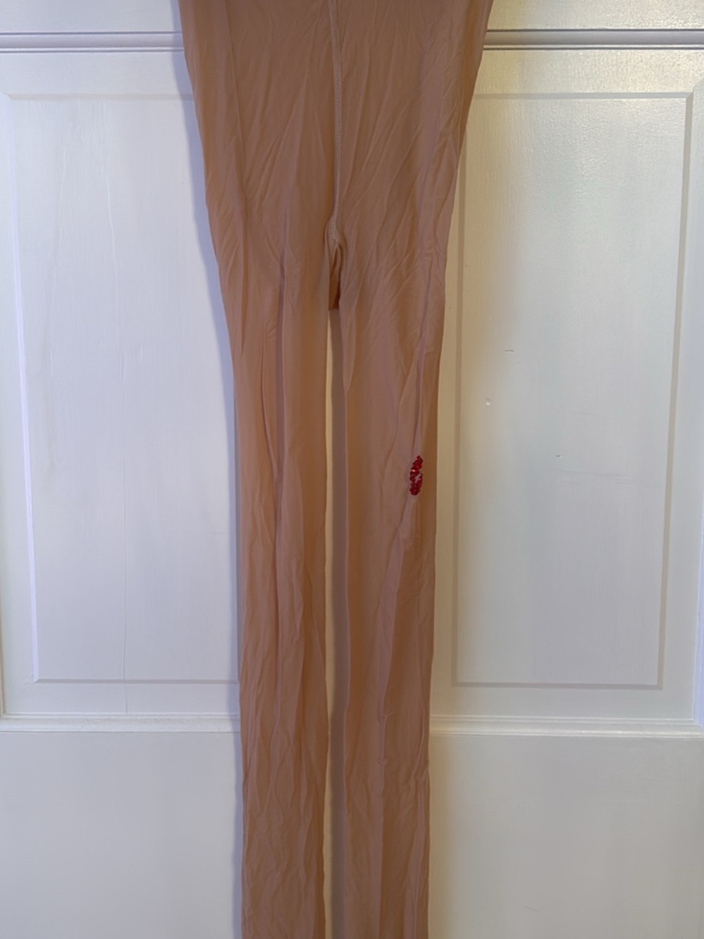 Sabrina Carpenter inspired nude tights with rhinestone kiss
